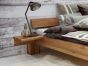 Bett massiv Eiche 180x200cm mit Ablagebrett