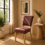 Lederstuhl Nora in Cognac und Eichegestell Gold