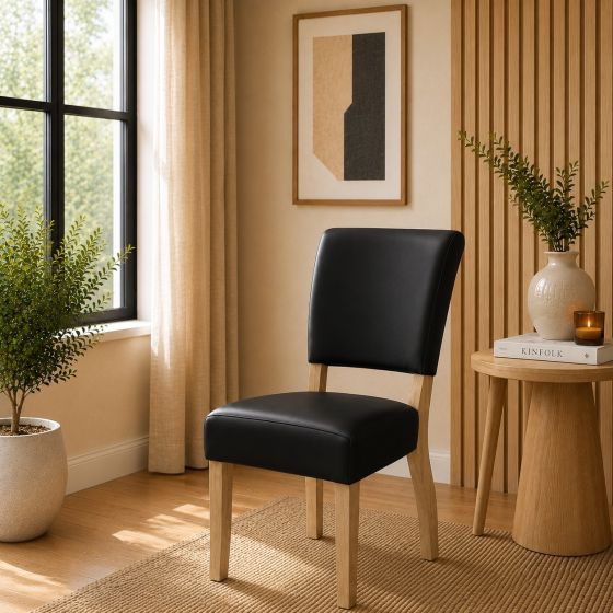 Lederstuhl Nora in Black und Eichegestell Gold