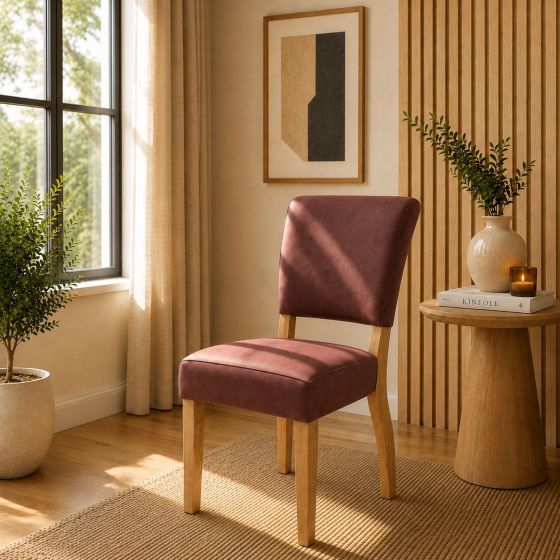 Lederstuhl Nora in Cognac und Eichegestell Gold