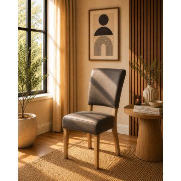 Lederstuhl Nora Bezug Graphite Gestell Eiche massiv Gold